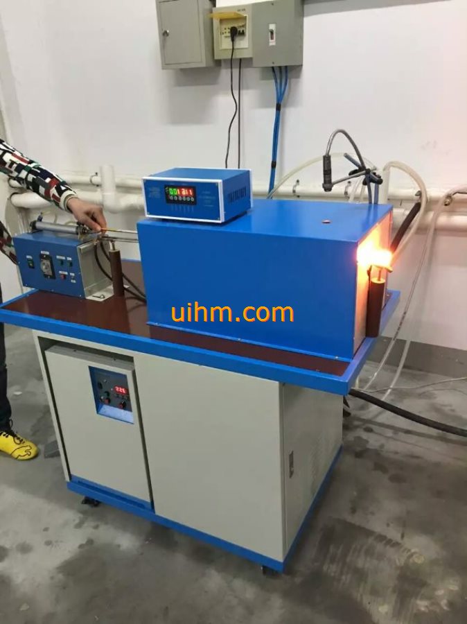 auto feed system for induction forging