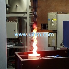 induction rotor heating prior to spray weld