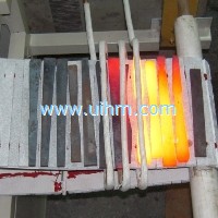 auto feed system for induction heating knife