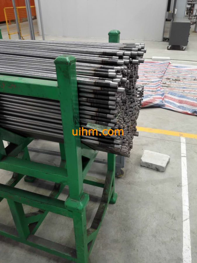 auto feeding system for induction forging steel rods (10)