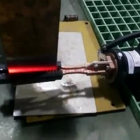 handheld induction coil with ferrite core for heating copper plate